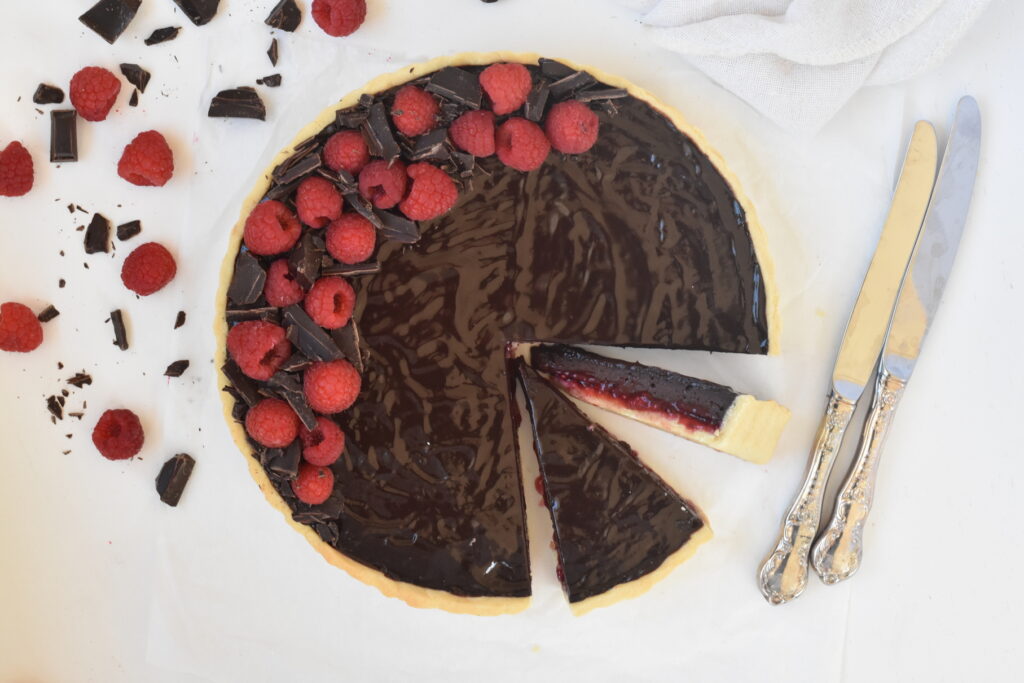Tart as shown from above with slices taken out of it.